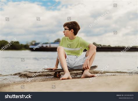 teenage boy barefoot|10 year old boy.